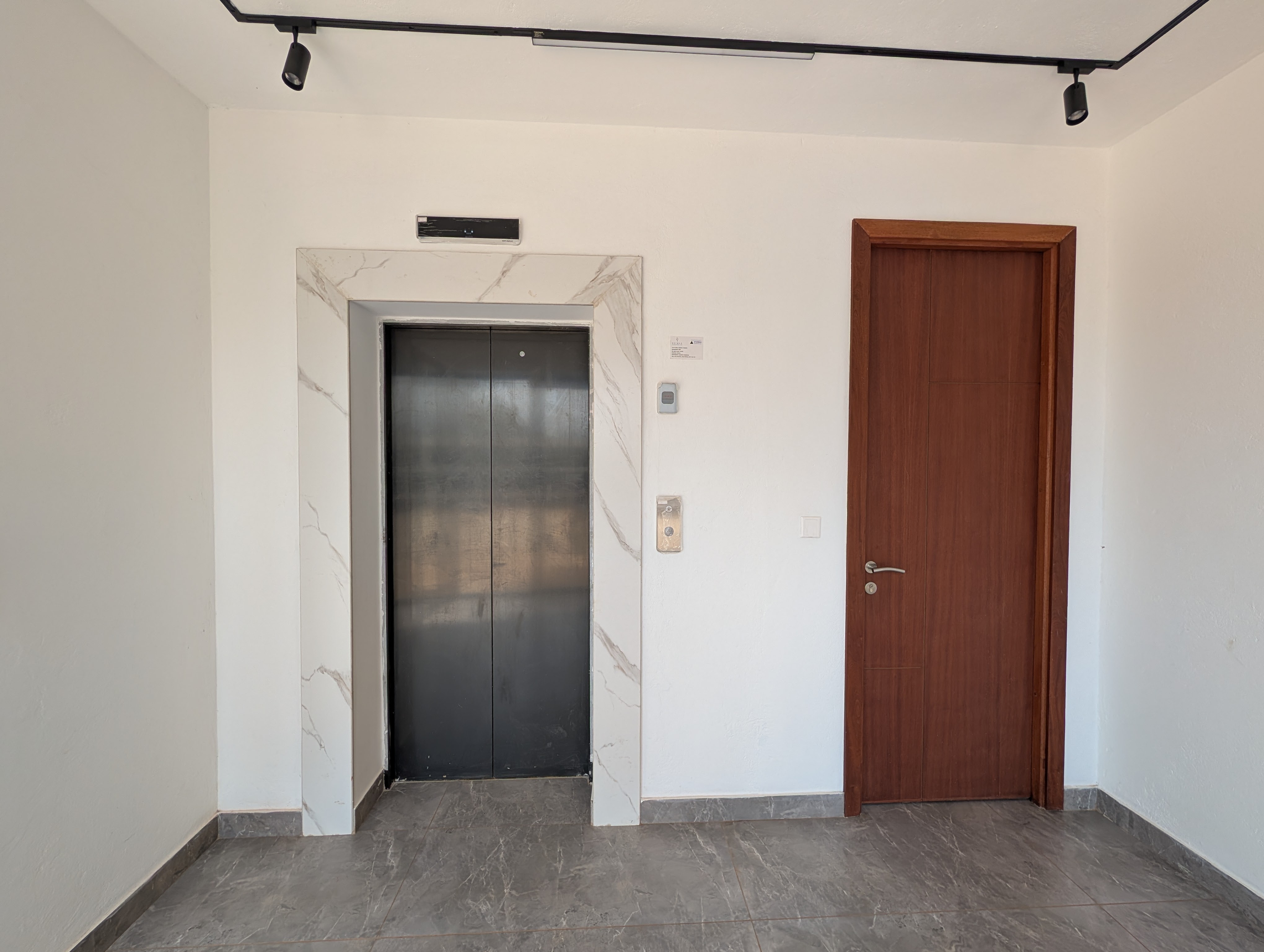 Elevator lobby with marble