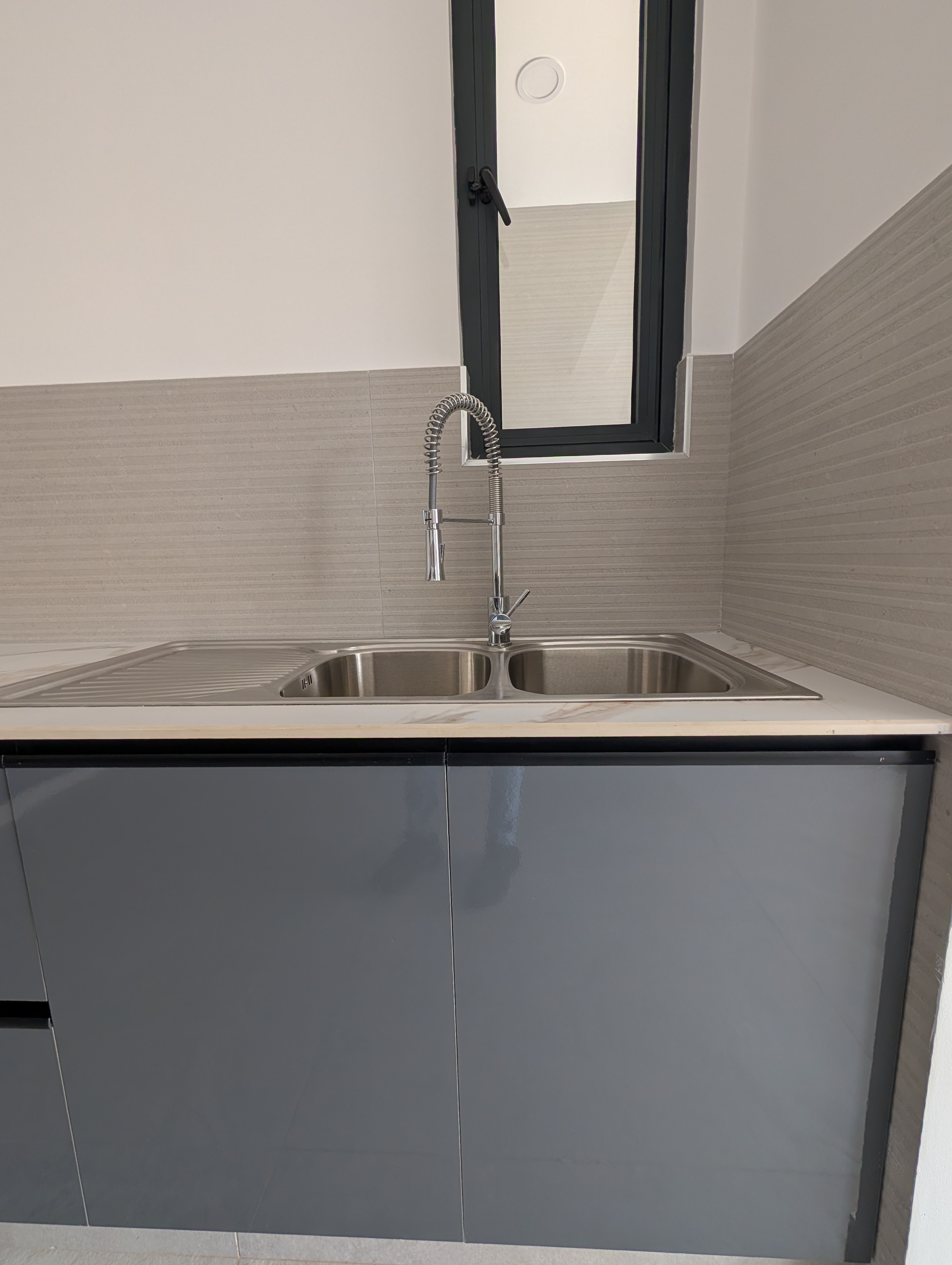 Kitchen sink and cabinetry